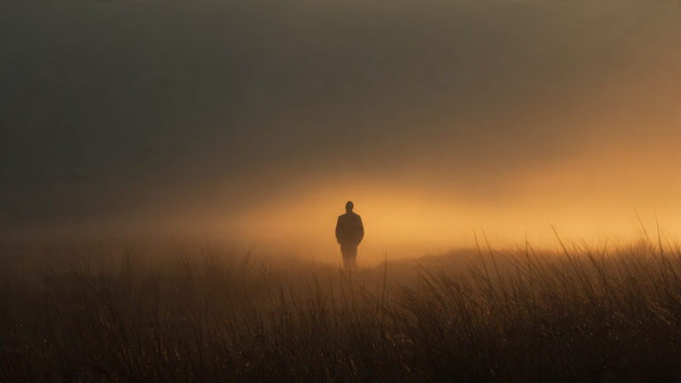 Cinematic-wide-shot-lone-person-standing-in-an-ope